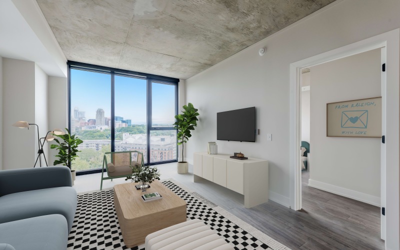 living room with floor to ceiling windows 