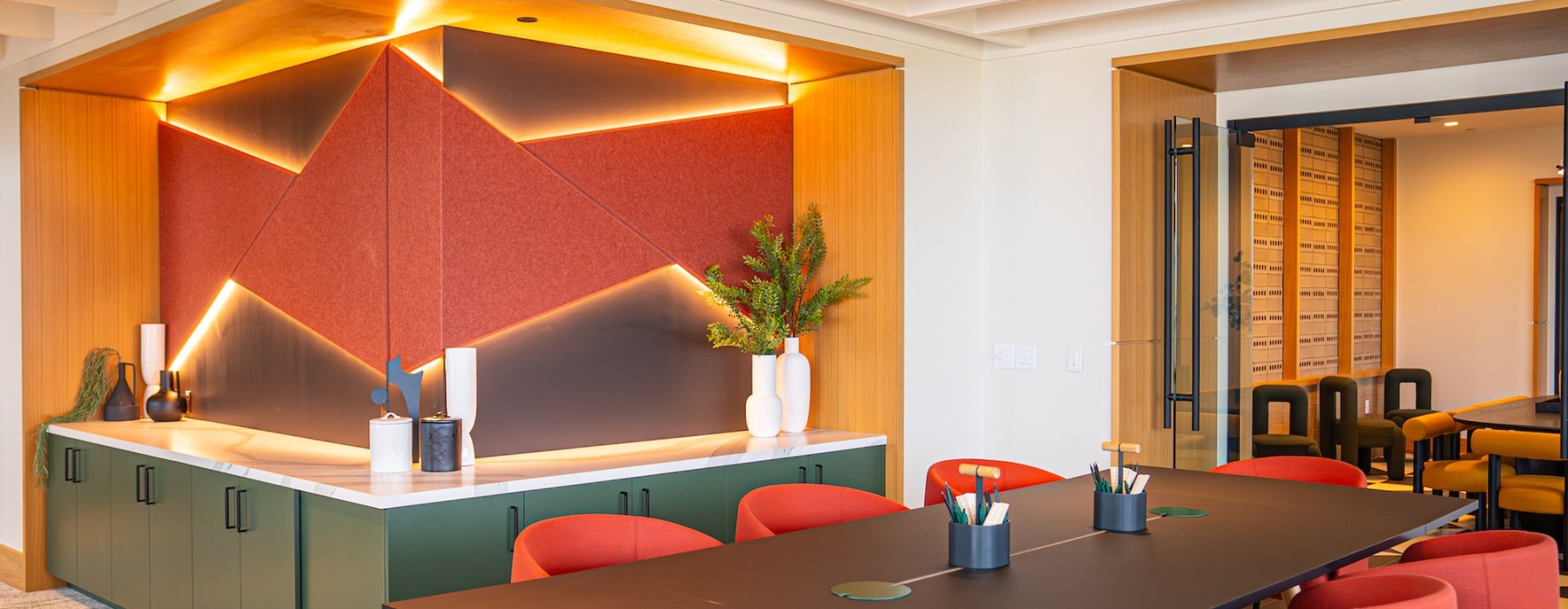 a lounge with seating and tables